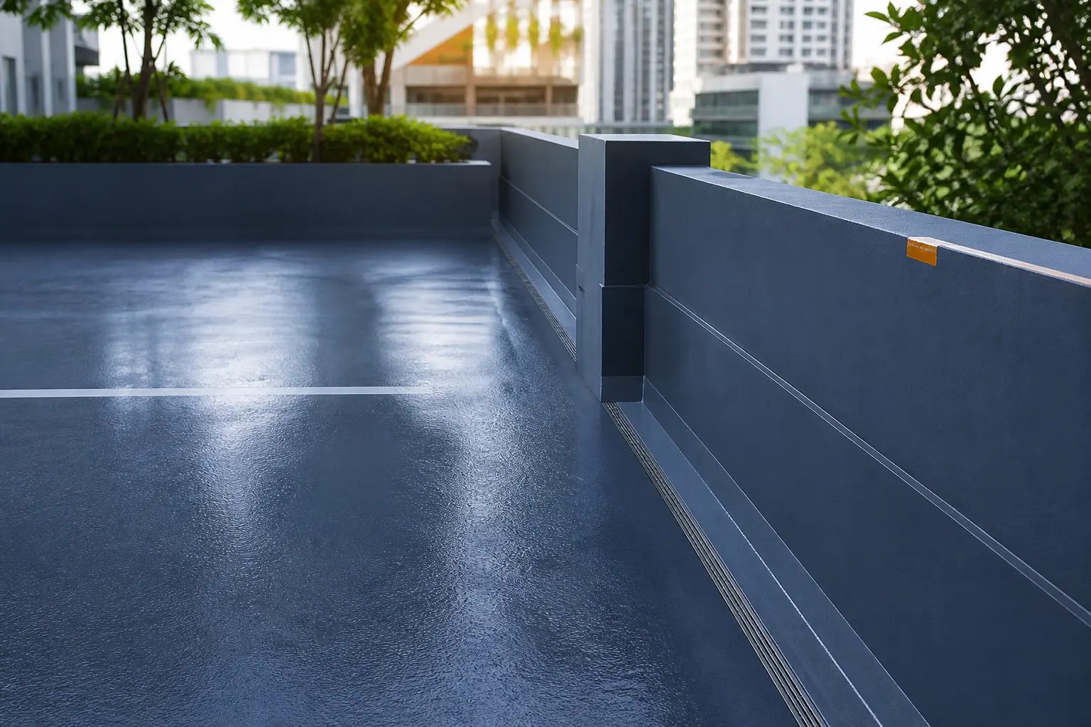 Continuous waterproofed traffic deck on an exposed Singapore car-park level with drainage and upstand details