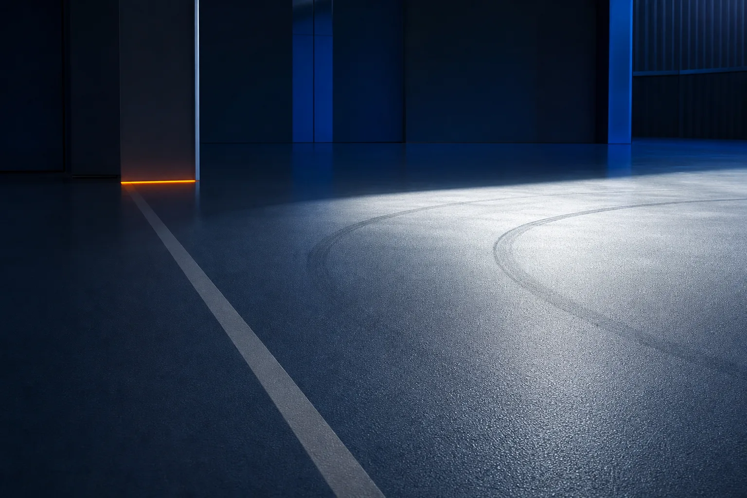 Cured satin industrial floor inspected under low-angle raking light